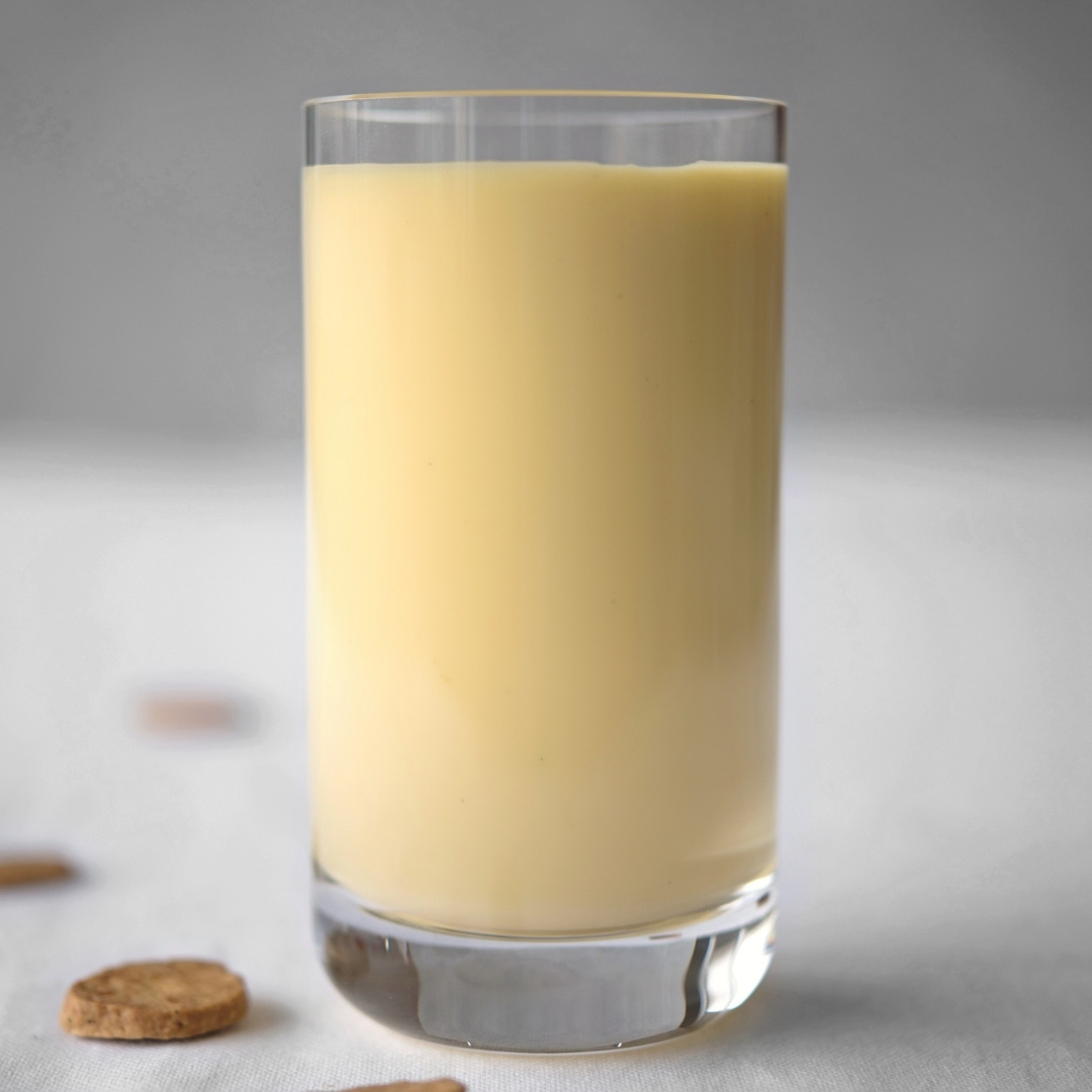 Yellow cream liqueur in a glass