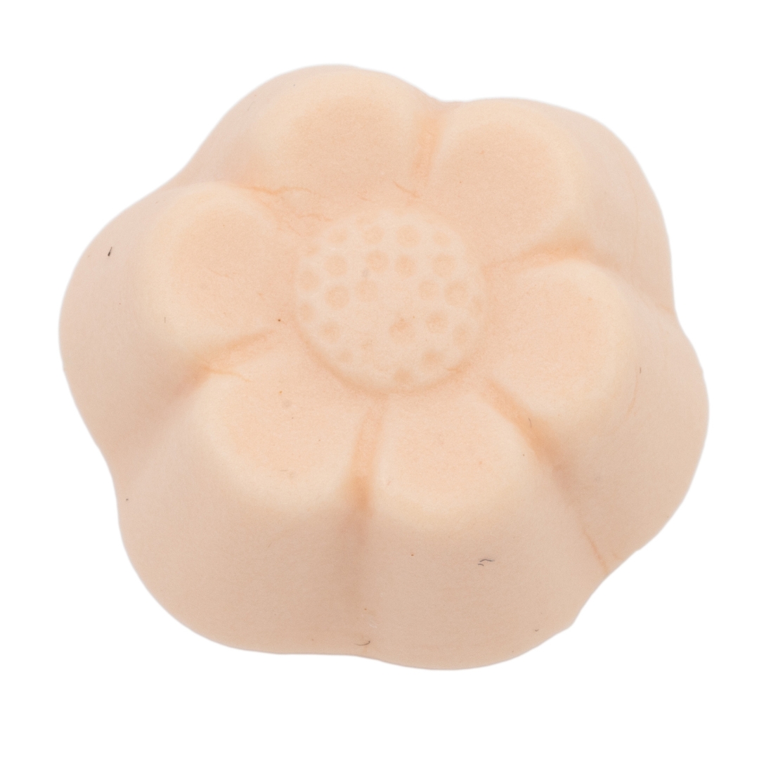 Orange, flower shaped aerated fruitgum