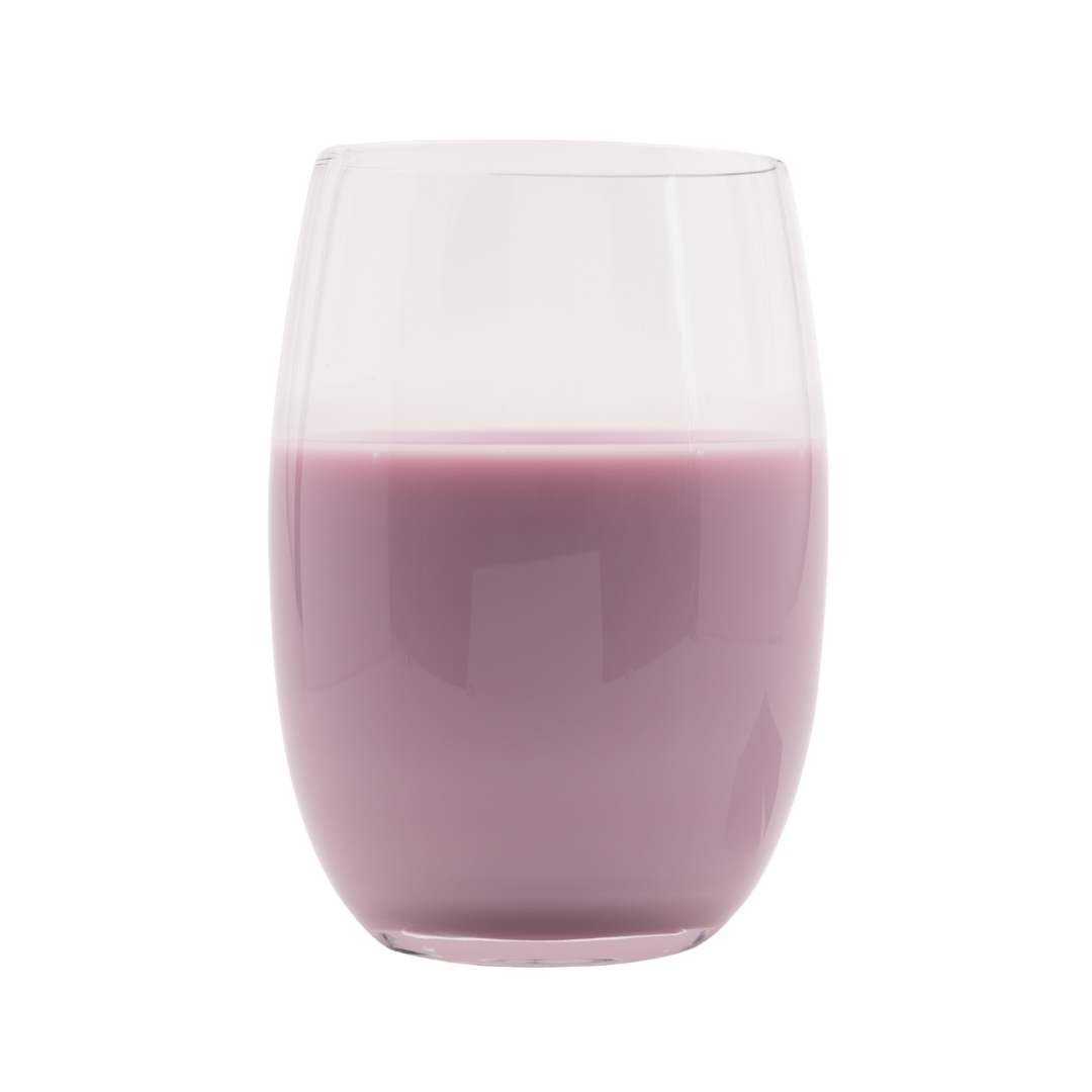 Red milk drink in a glass