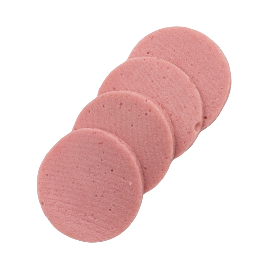 Plant-based alternative to sliced meat in pink