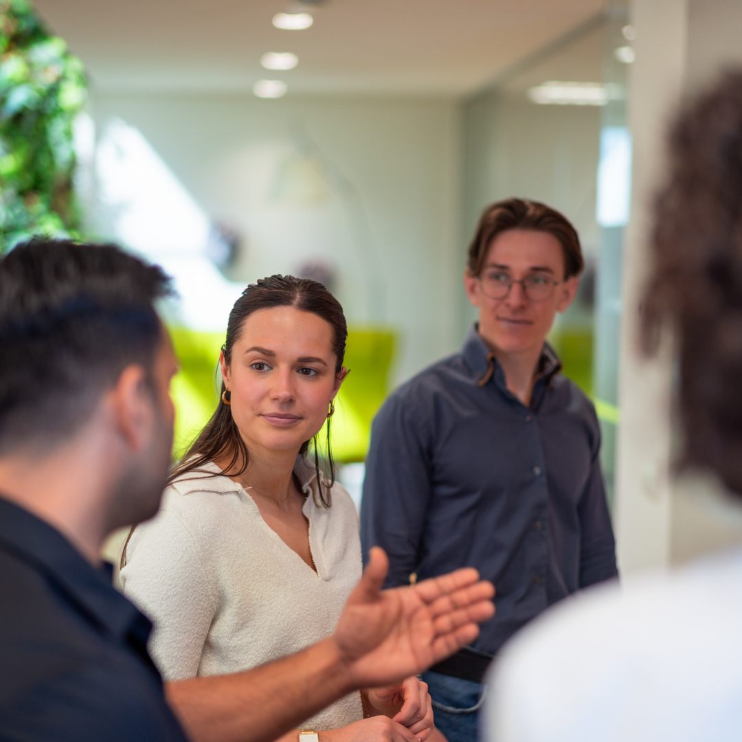 GNT employees collaborating in the office