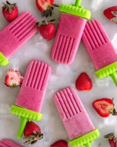 Pink strawberry popsicles