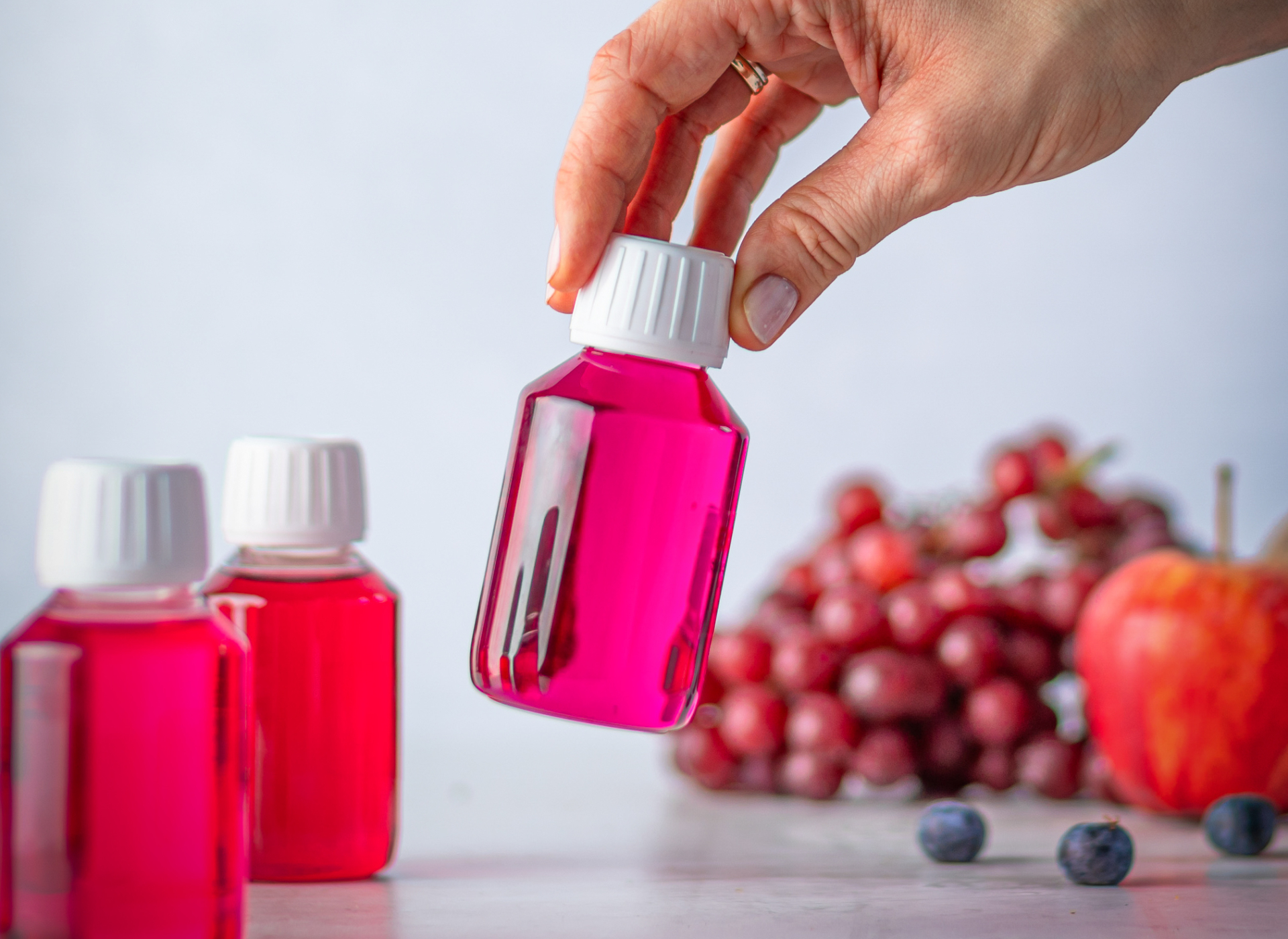 EXBERRY bottles and fruits