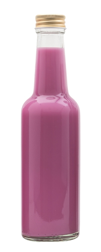Pink cream liqueur in a glass bottle