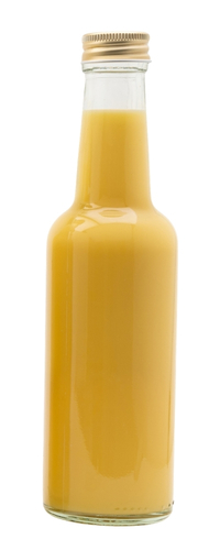 Yellow cream liqueur in a glass bottle