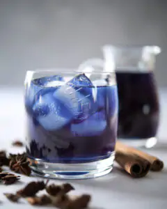 Dark blue drink with ice cubes