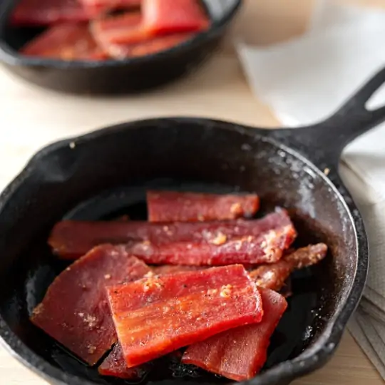 Parsnip bacon in a cast iron skilet, from the redefining plant-based article