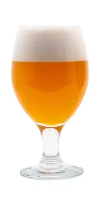 A glass of yellow colored beer
