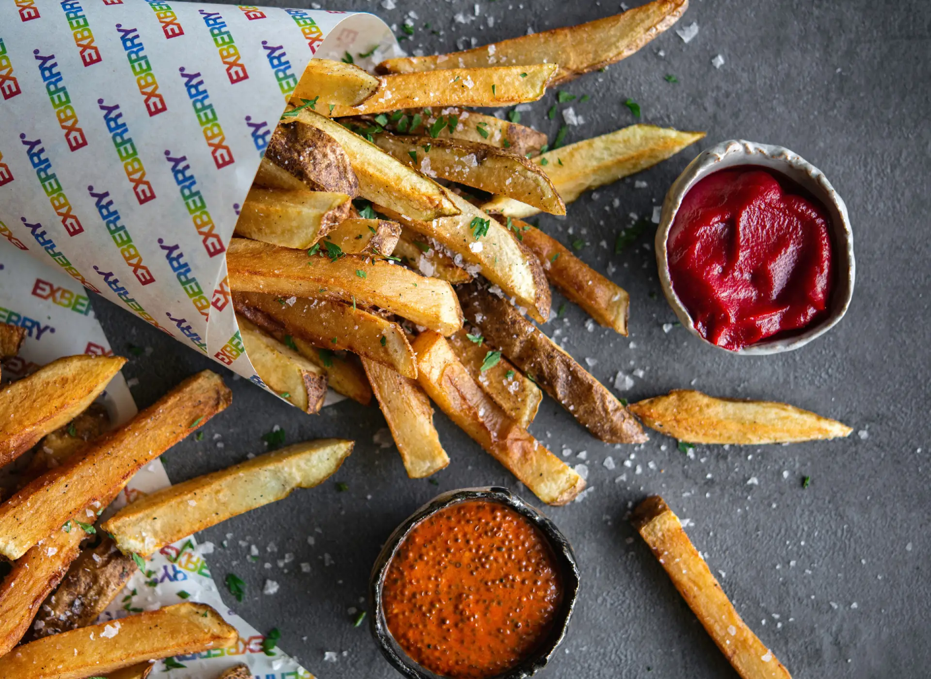 Fries with a red and orange sauce